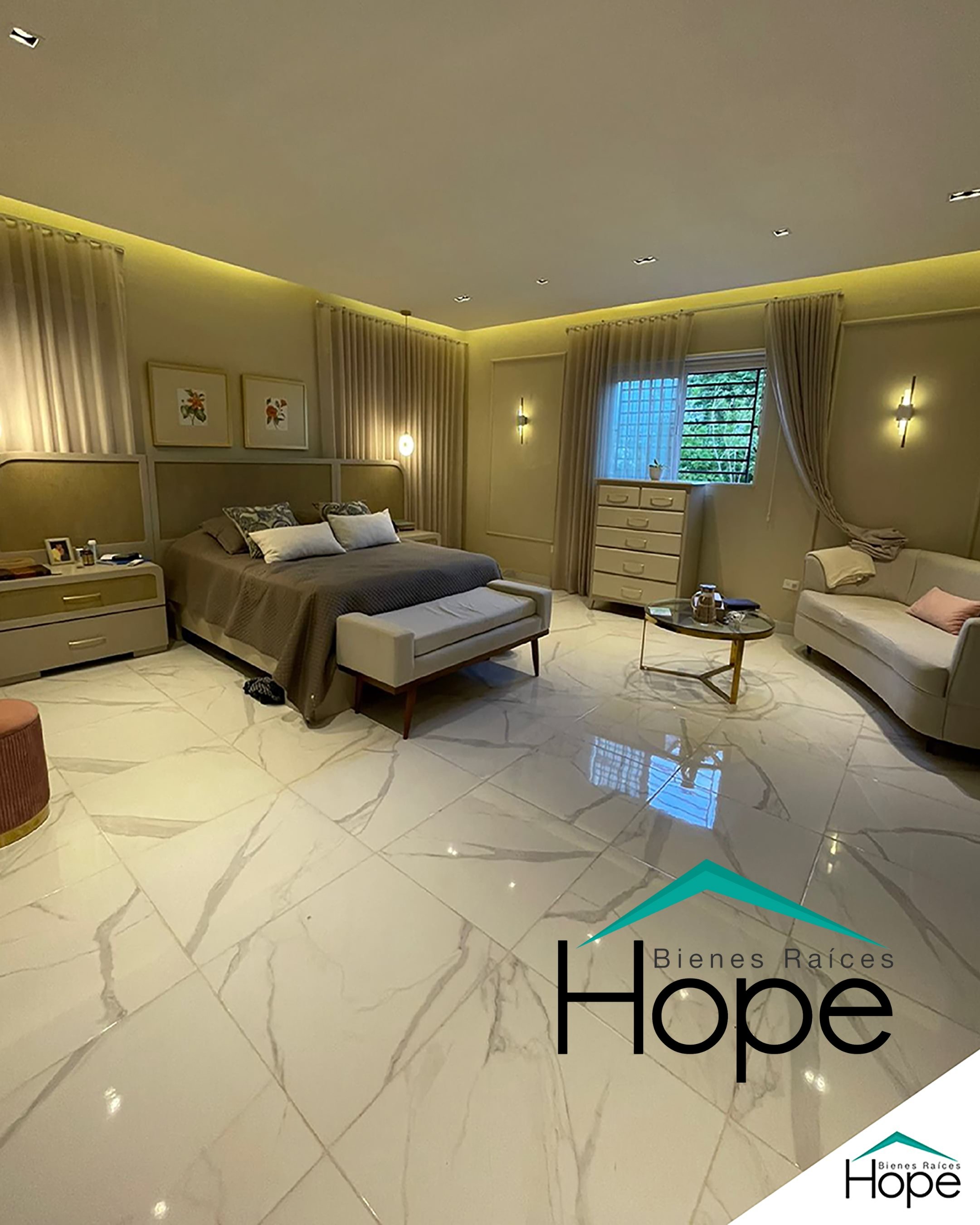  9- Habitación principal con logo